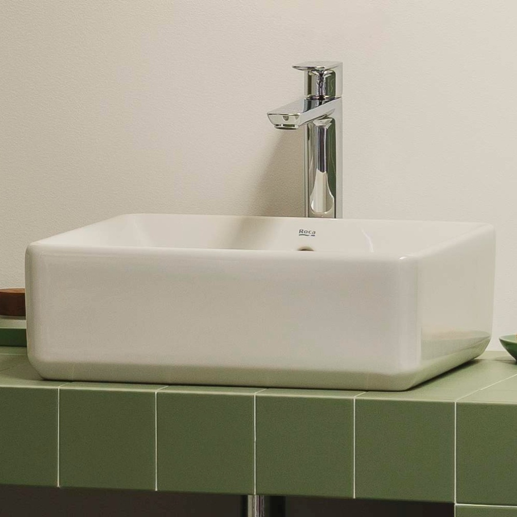 Lifestyle image of the Roca The Gap 390mm Square Countertop Basin mounted on a tiled countertop